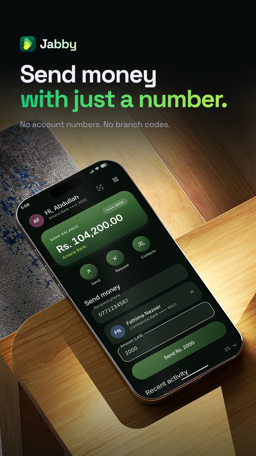 Jabby on an iPhone: the home screen shows a bank balance and a payment of Rs. 2,000 to Fathima Nazeer, found from her phone number 0771234567.